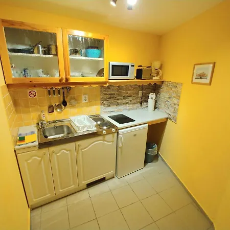 Апартаменты Zoeld Sziget Apartmanhaz *